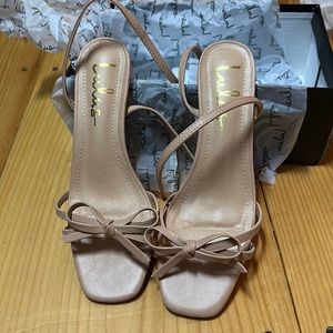 New lulus nude heel. These are new in the box and have never been worn.